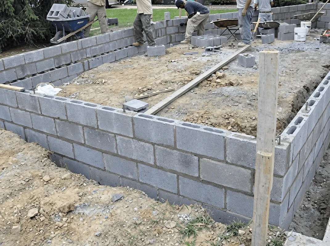Professionals building a foundation with blocks in Seattle, WA