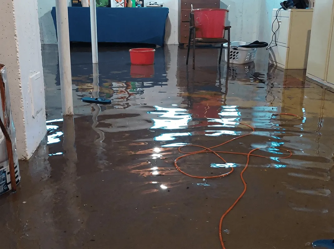 Basement with boiler, cabinets and washing machine completely flooded in Seattle, WA